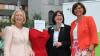Vorstellung Nationale Politikstrategie Bioökonomie: Wanka, Lang, Aigner neben rotem Kleid aus Milch Vorstellung Nationale Politikstrategie Bioökonomie: Wanka, Lang, Aigner